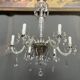 Venetian chandelier decorated with clear crystal and rare coloured crystal.