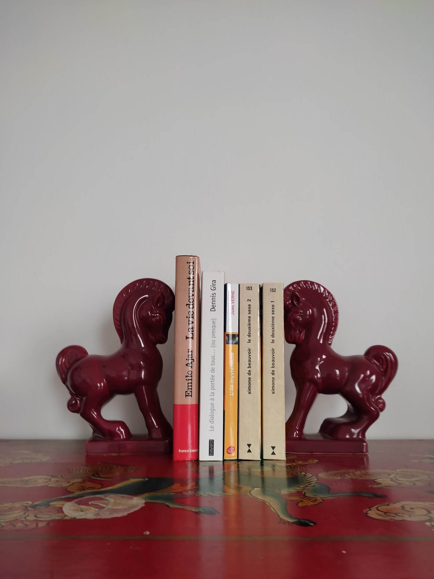 Pair of red porcelain horse bookends