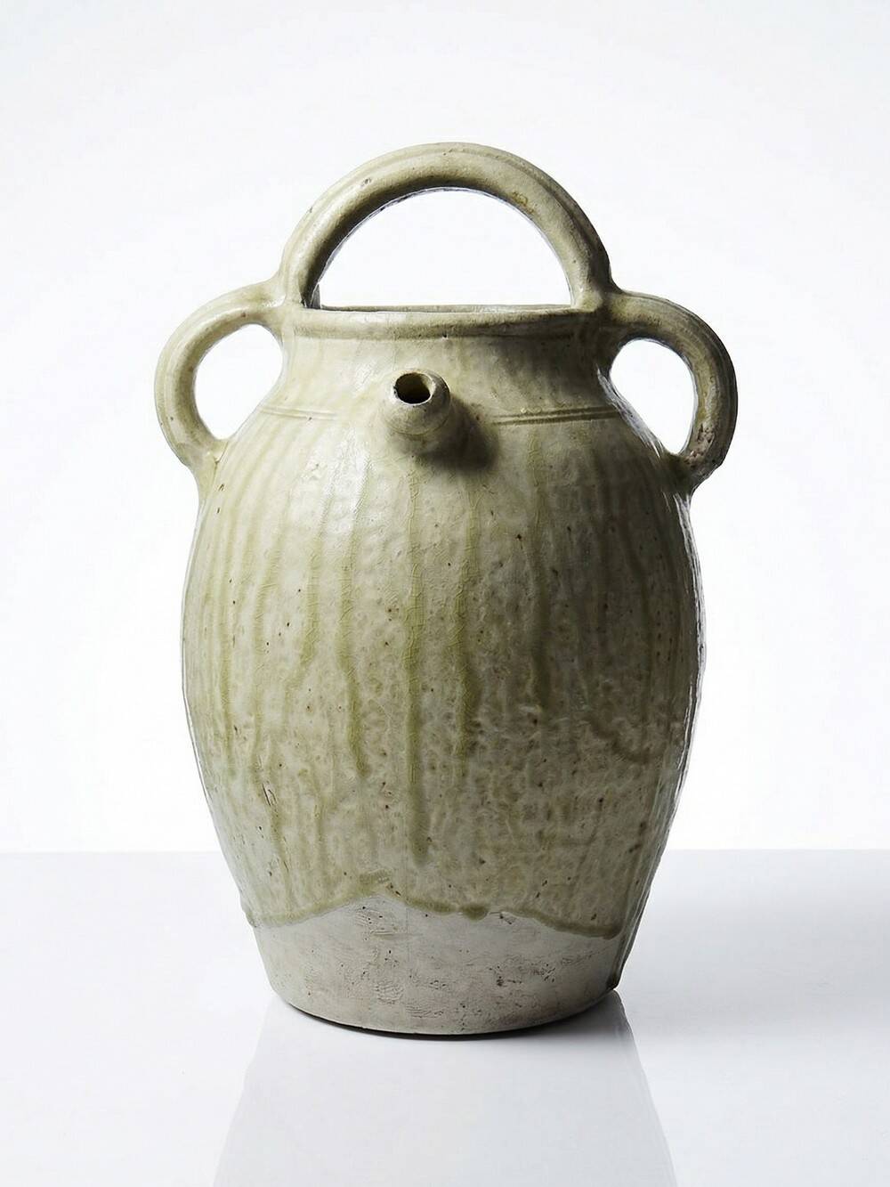 Green ash-glazed stoneware casserole from Puisaye, late 19th to early 20th century.