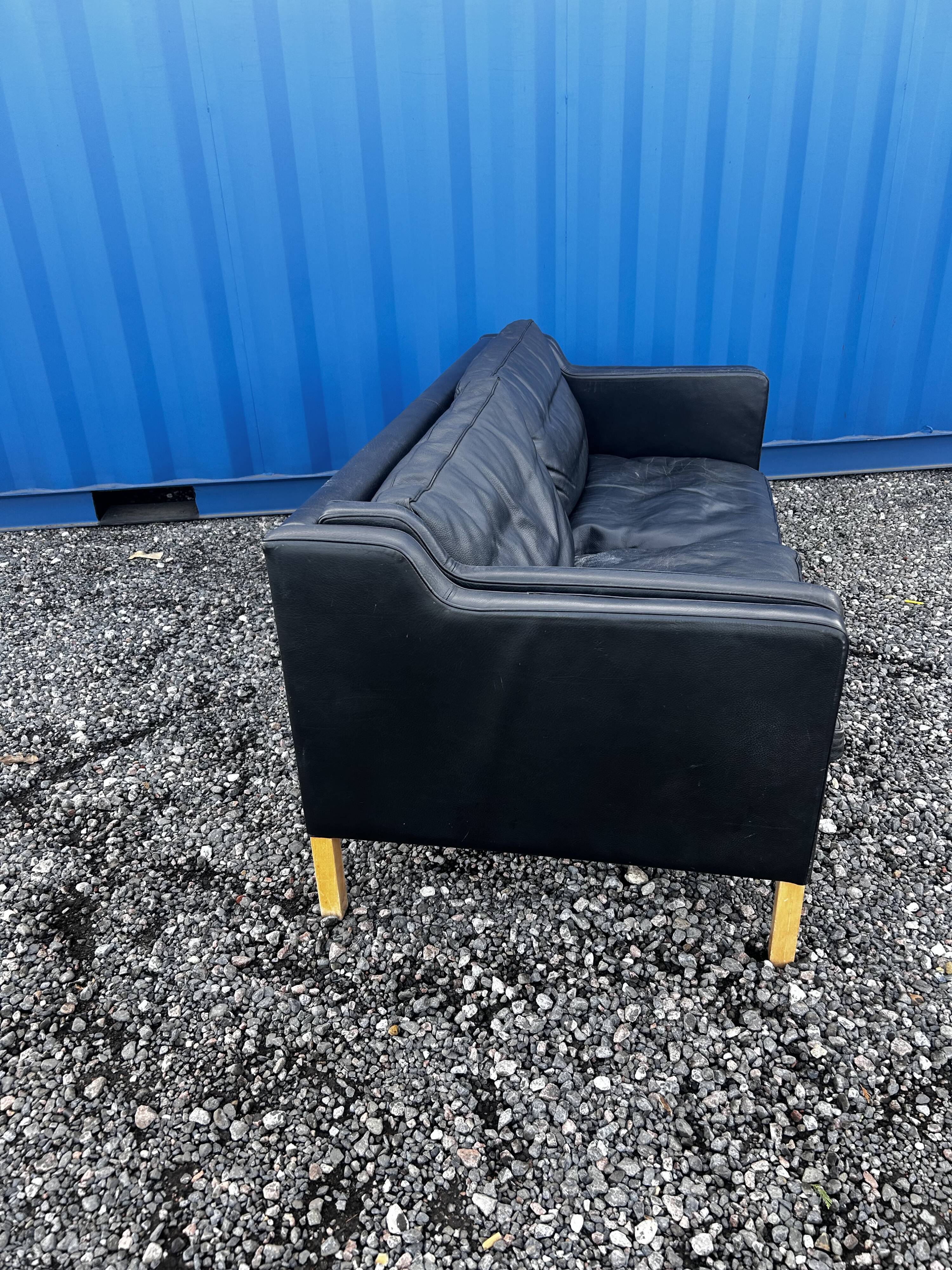 Danish vintage two and half seater black leather Stouby sofa 1960s