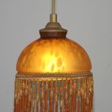 Vintage French amber mottled glass hanging ceiling light with beaded fringe.