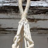 Hanging plant holders in macramé and rattan