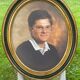 Set of 2 medallion frames in molded wood and canvas