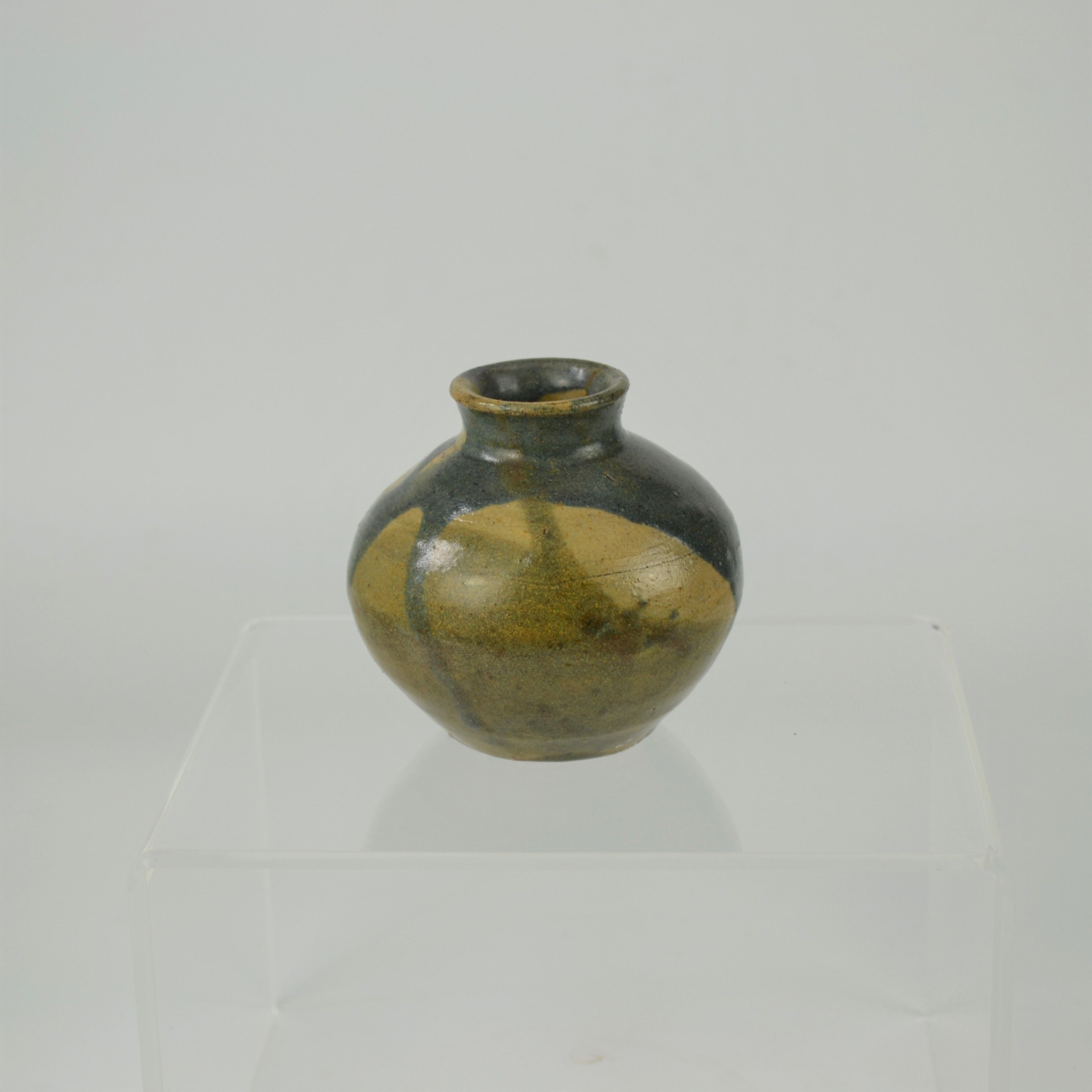 Sandstone ball vase by Eugène Lion