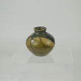 Sandstone ball vase by Eugène Lion