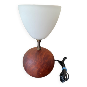 Small wooden ball lamp with moulded glass shade.