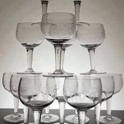 9 guilloché wine glasses, early 20th century.