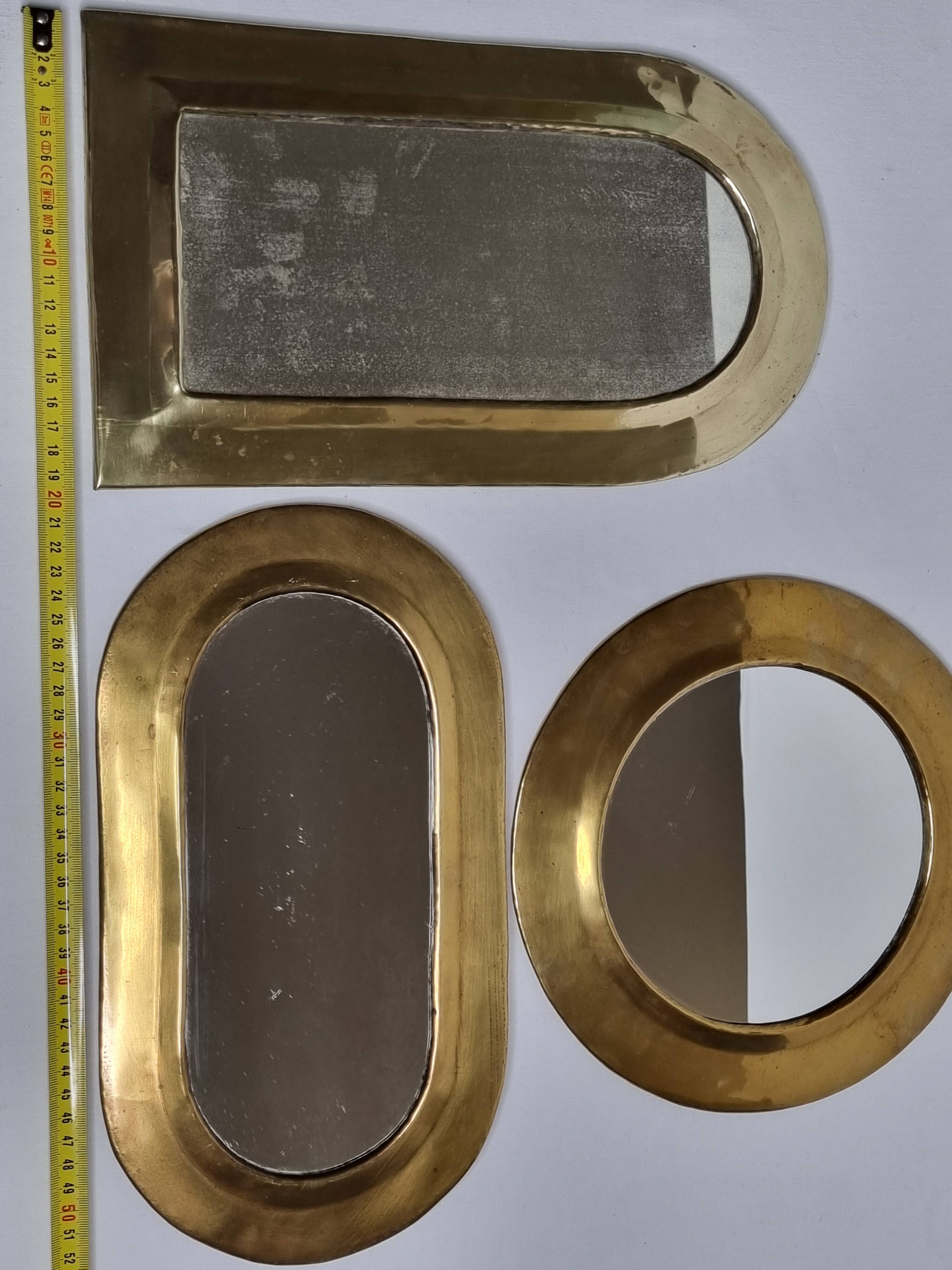 Set of three antique Moroccan brass mirrors, 32 cm