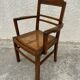 Cane armchair with armrests