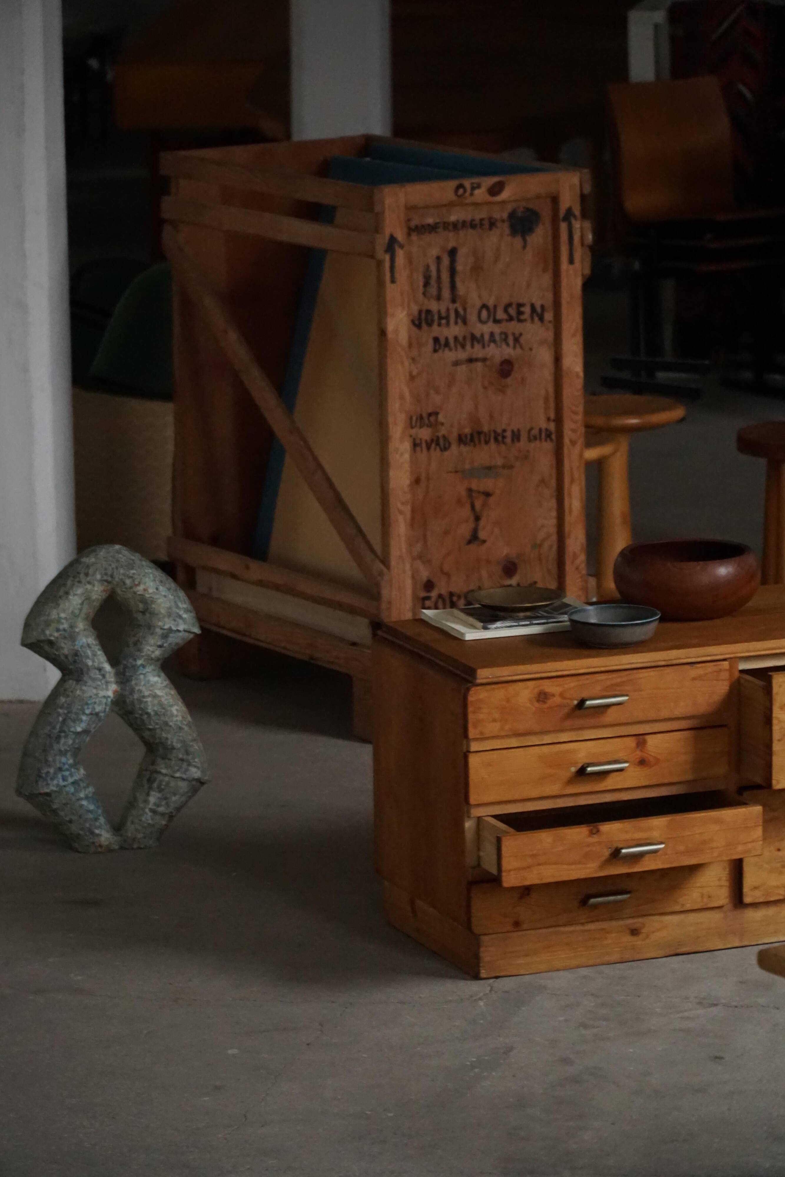 Mid-20th century Art Deco chest of drawers in pine with metal handles, 1940s.