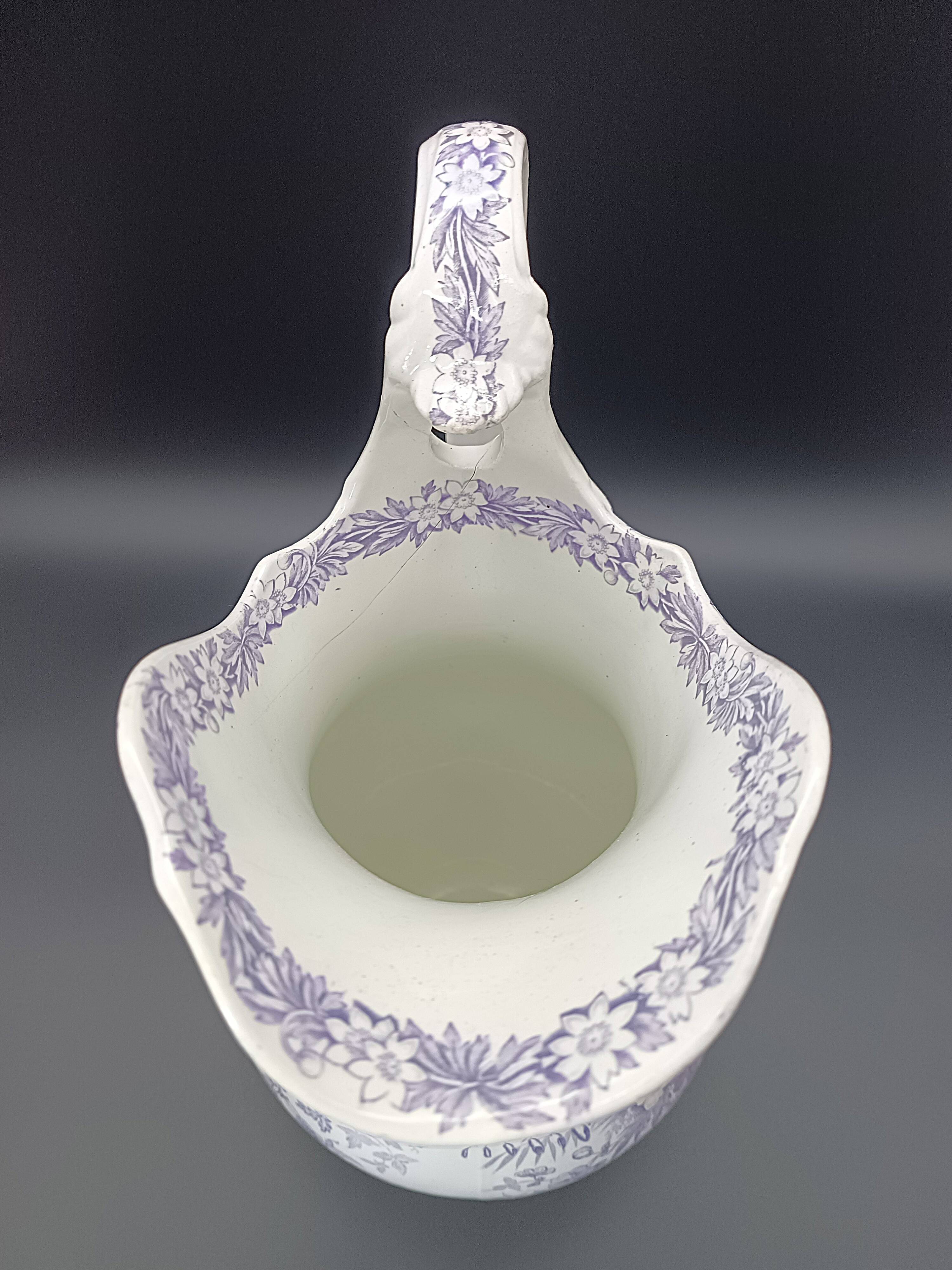 Large antique toilet bowl by Jules Vieillard Bordeaux with violet floral decoration.