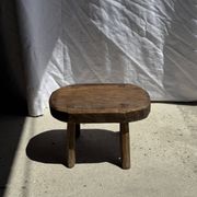 Small stool, oval solid teak accent stool with a two-tone seat.