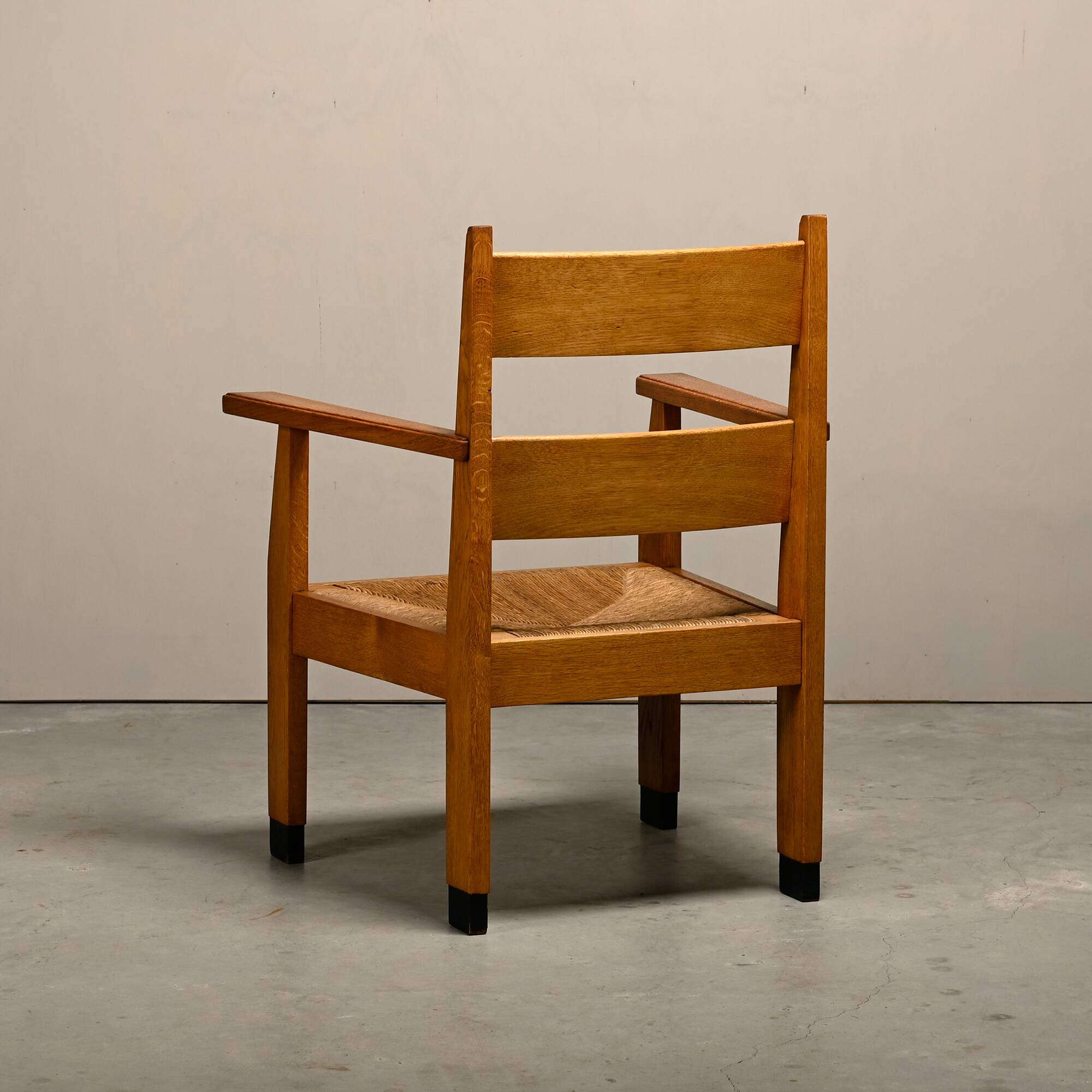 Art Deco Haagse School Armchair in solid Oak and Straw, 1930s