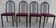 4 metal chairs with burgundy imitation leather seats from the Souvignet brand