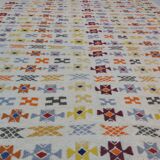 Tapis blanc à motifs berbères multicolore fait main en pure laine