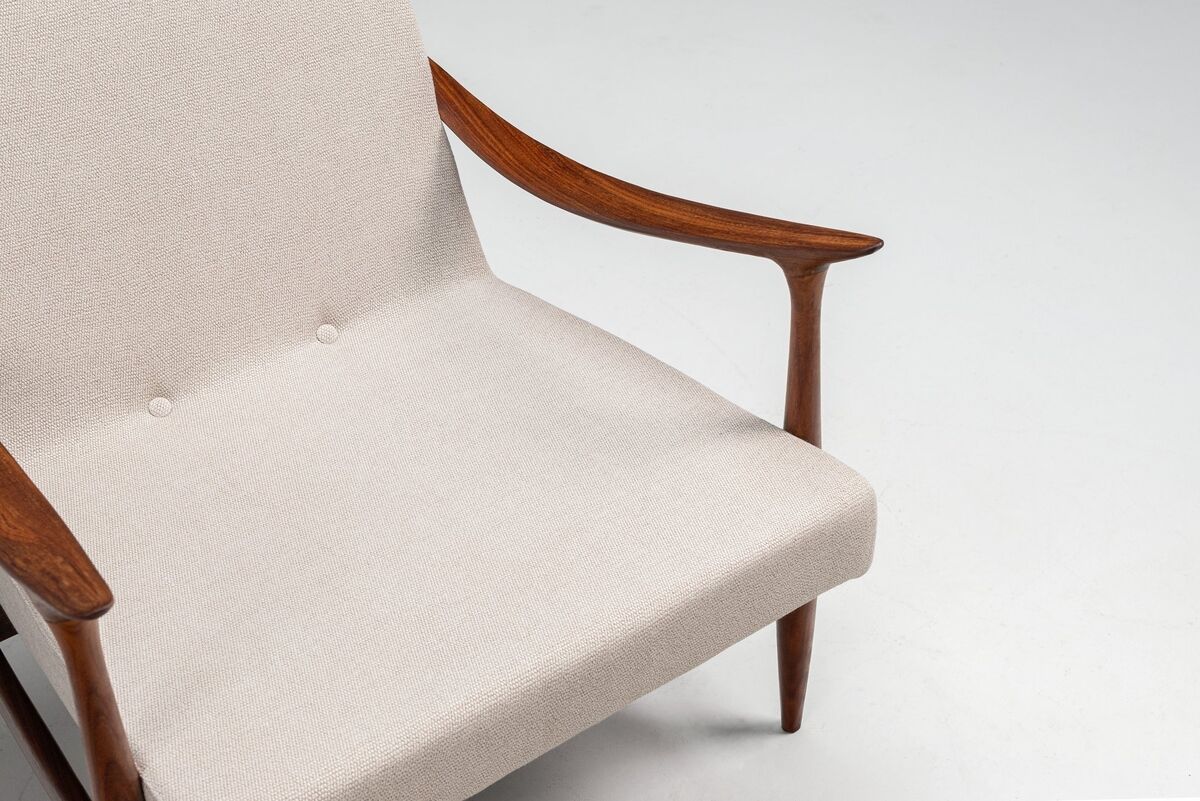 Sculptural Danish lounge chair in teak and fabric Denmark 1960