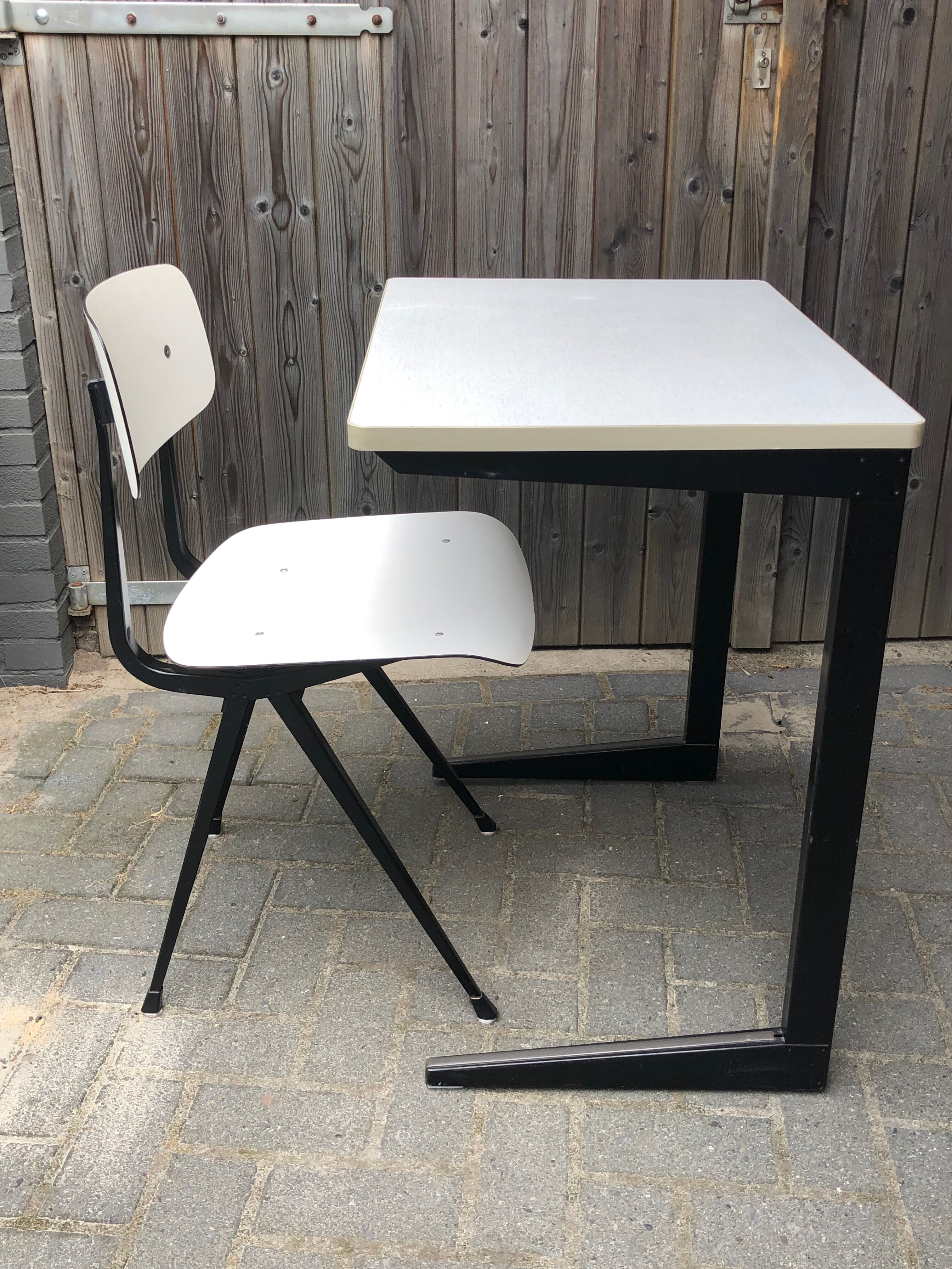 Desk and chair by Friso Kramer Ahrend de Cirkel Result