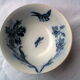Ramekin in earthenware with decoration of flowers, butterflies and birds