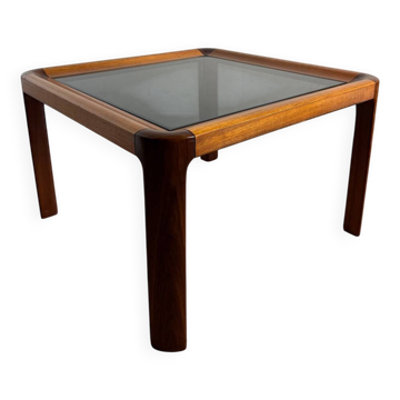 Square wooden coffee table with glass.