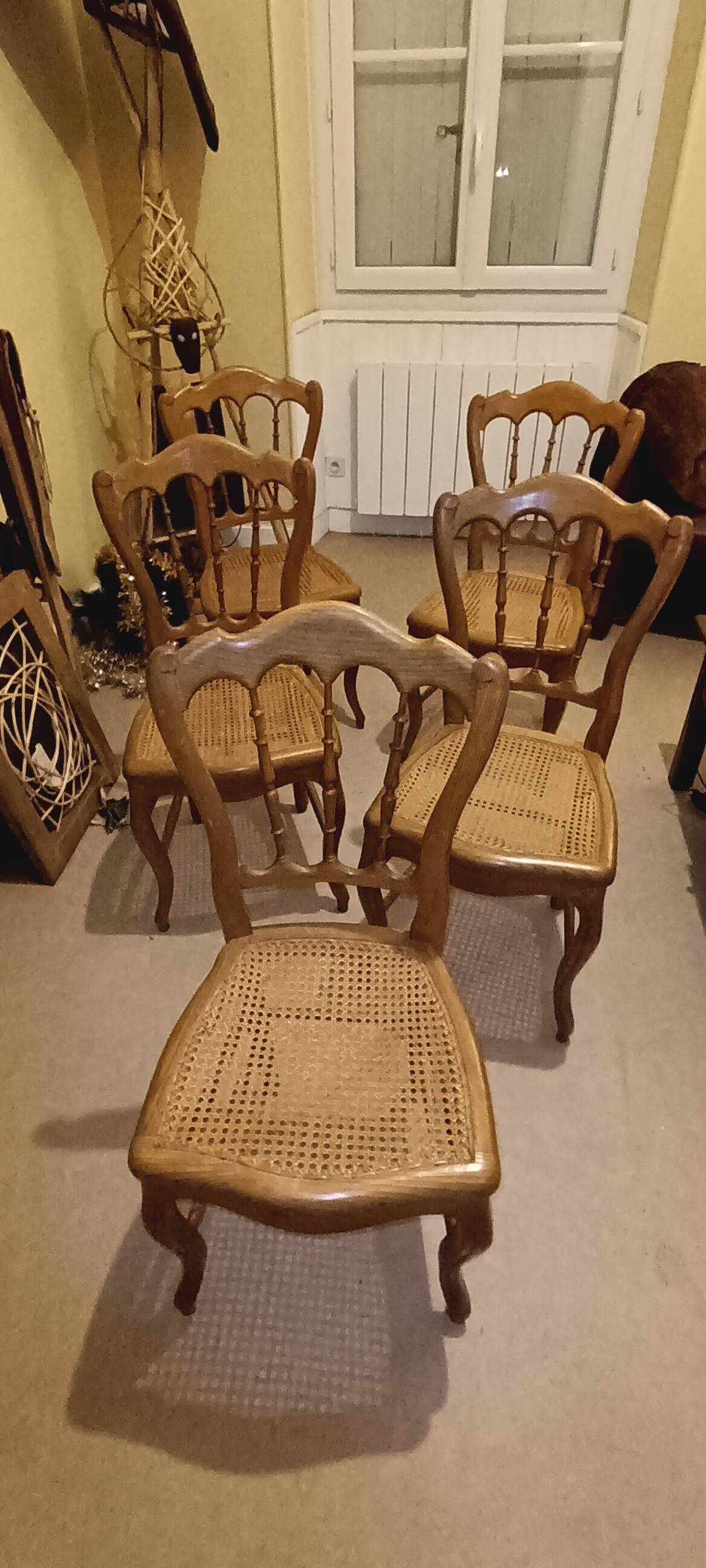 5 old caned chairs