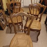 5 old caned chairs