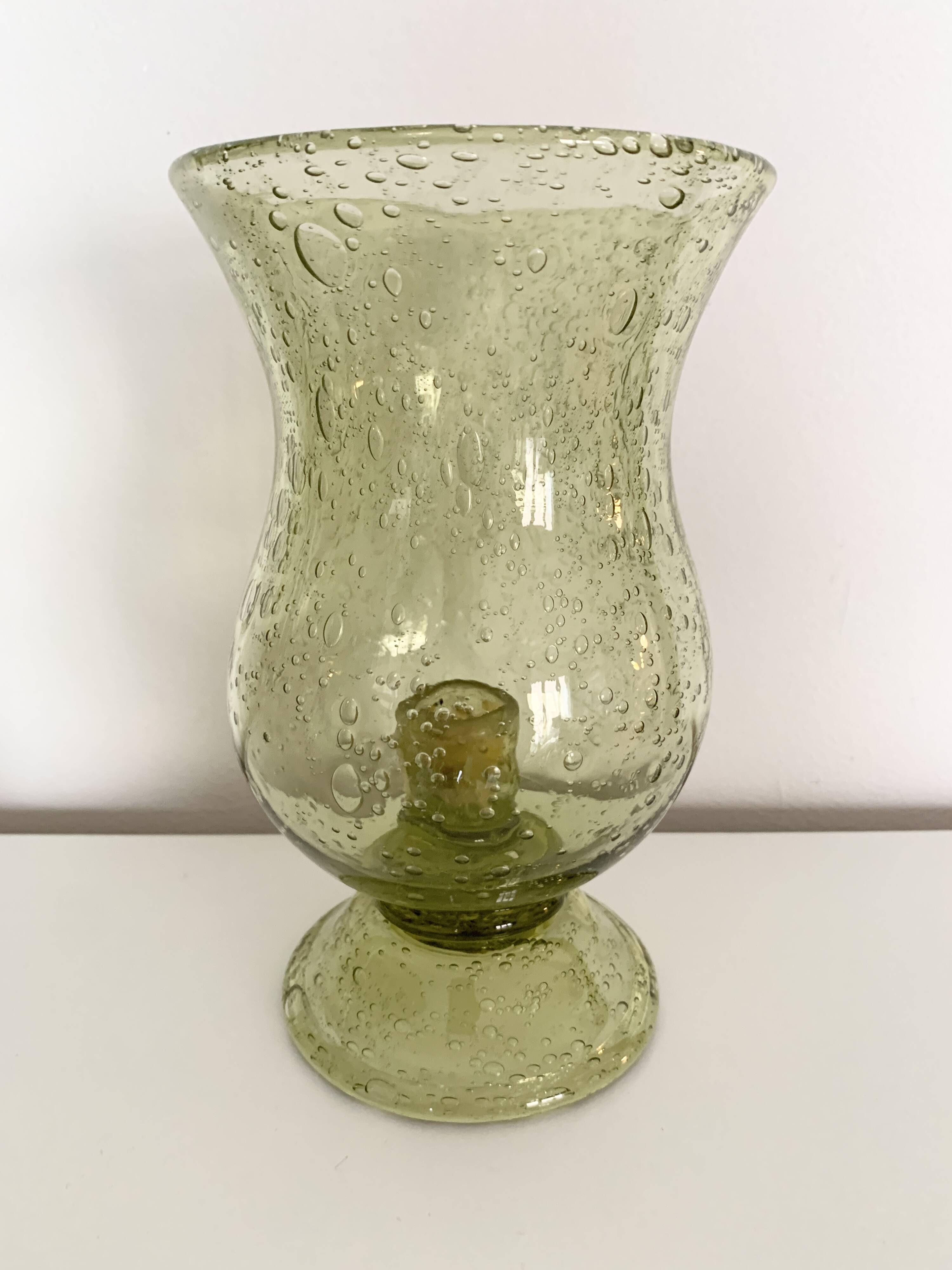 Important green bubbled glass candlestick