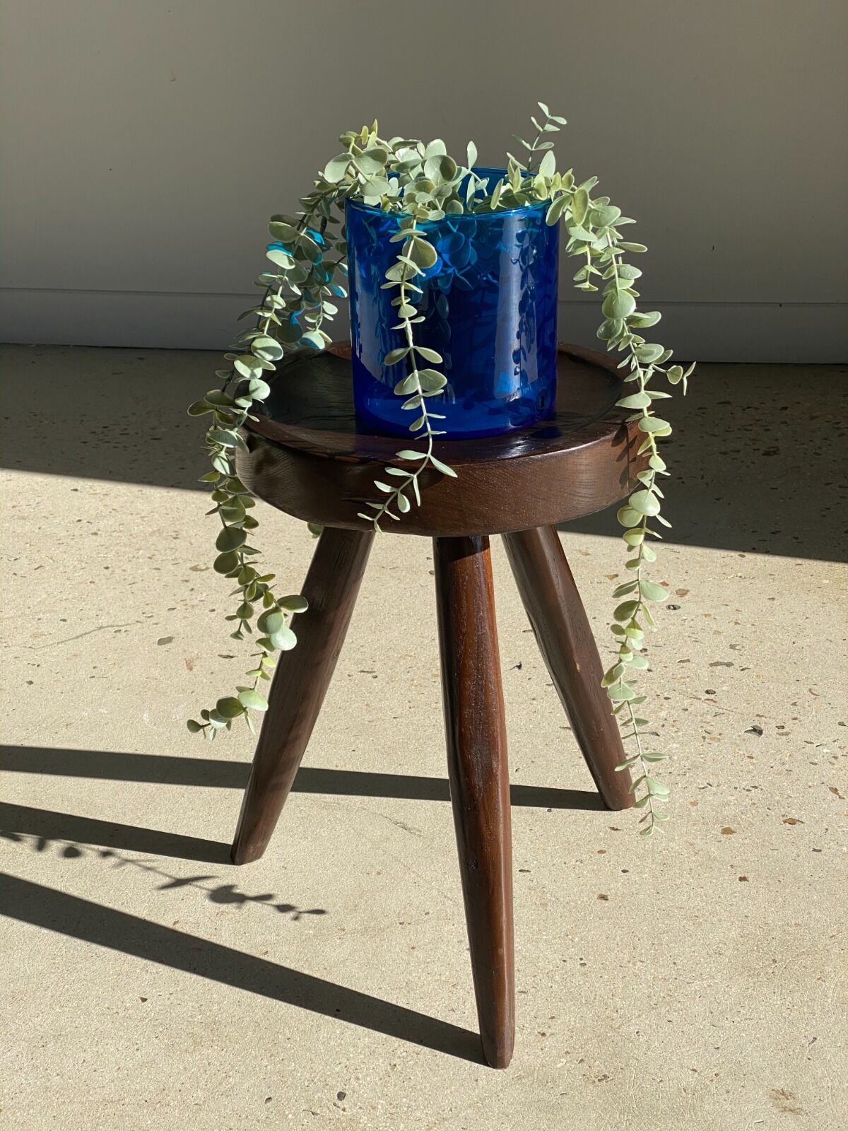 Brown solid wood stool seated circular dug
