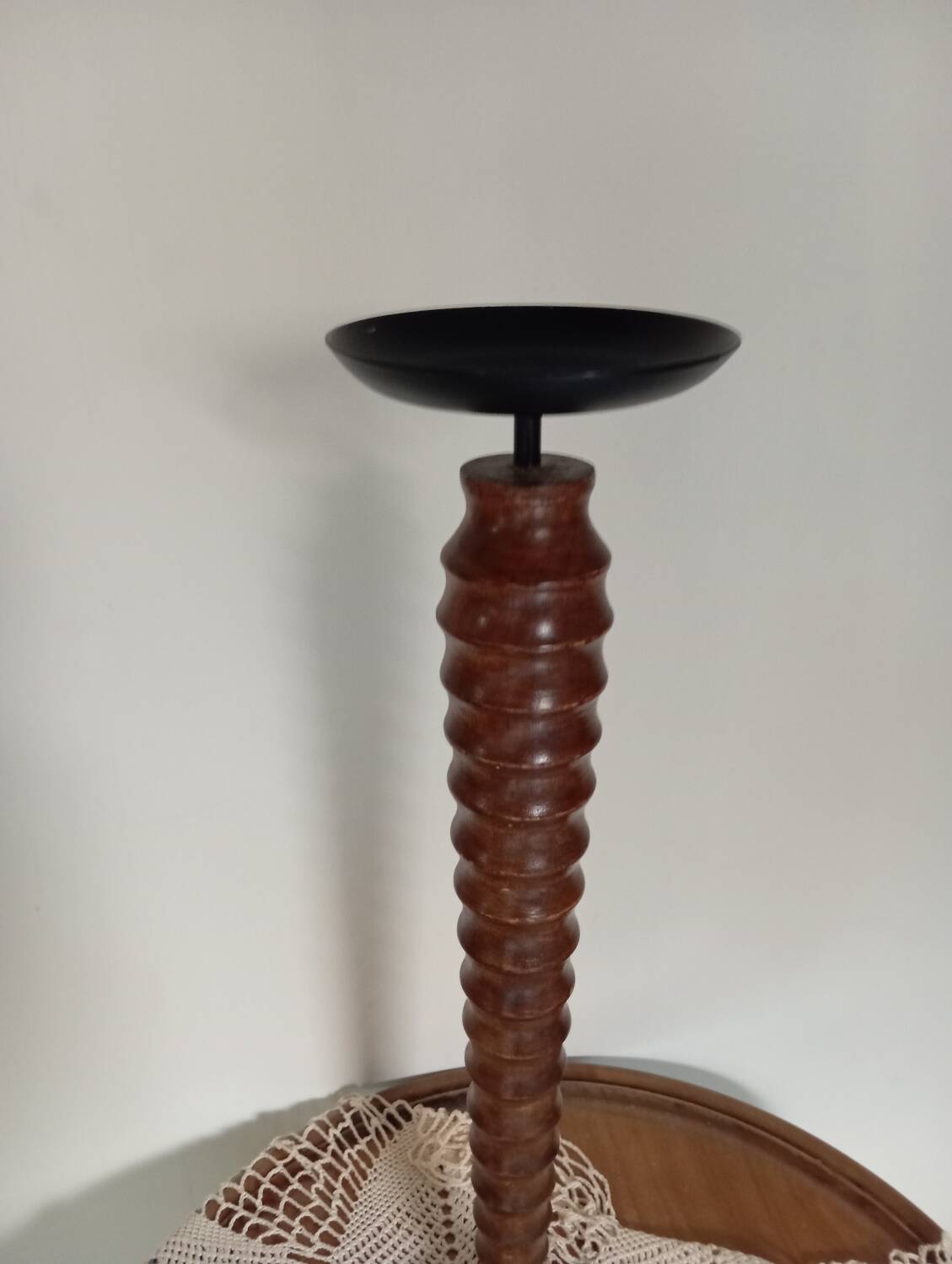 Vintage turned wooden candle holder, black metal candle base
