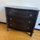 Black wooden chest of drawers