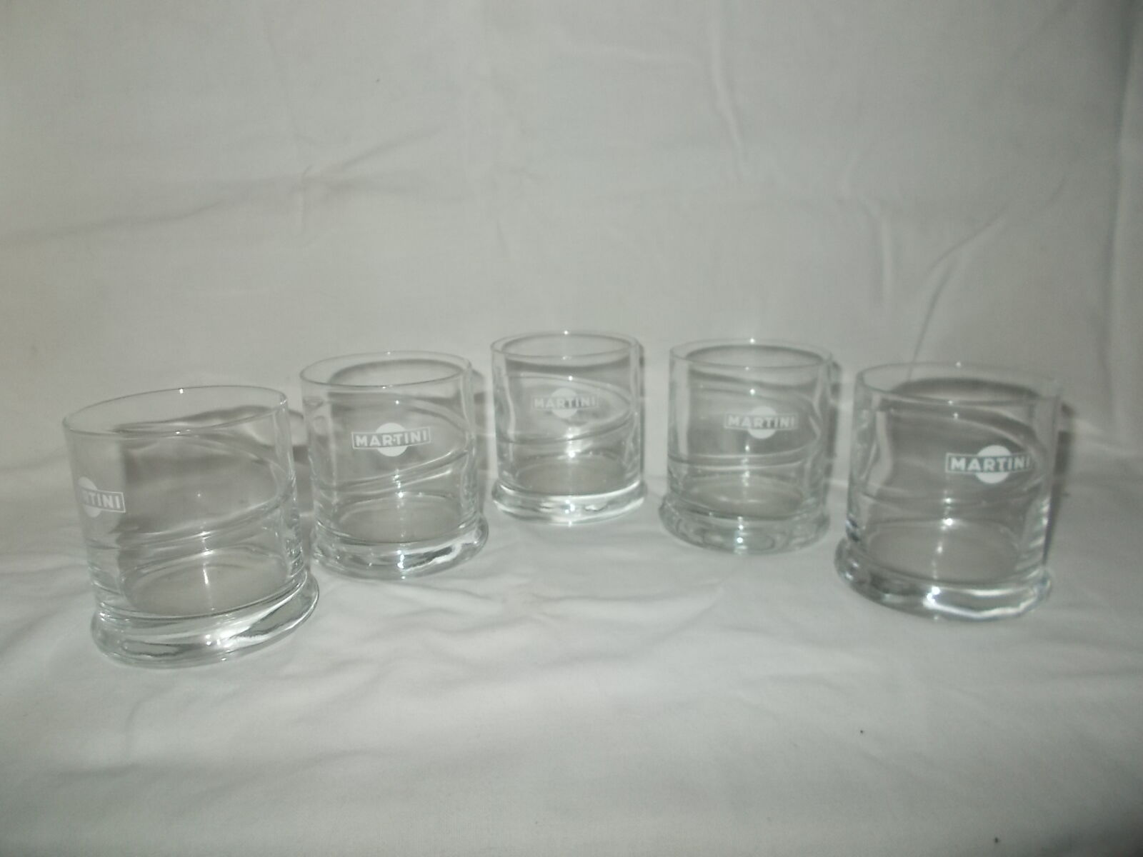 Lot of 5 bistro advertising martini glasses.