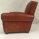 Large club chair in cognac leather