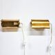 A pair of charming wall sconces/branches in brass with a star pattern, modern Scandinavian style.