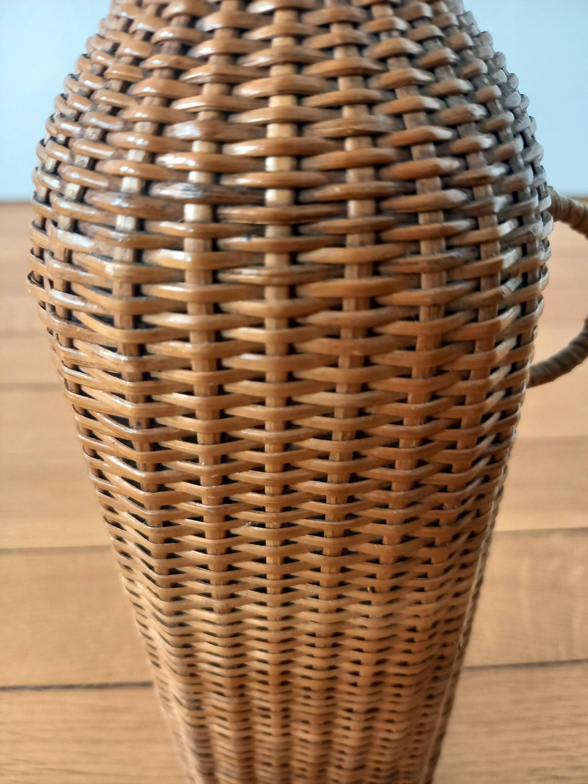 Bottle, old carafe in glass and wicker, 1950s