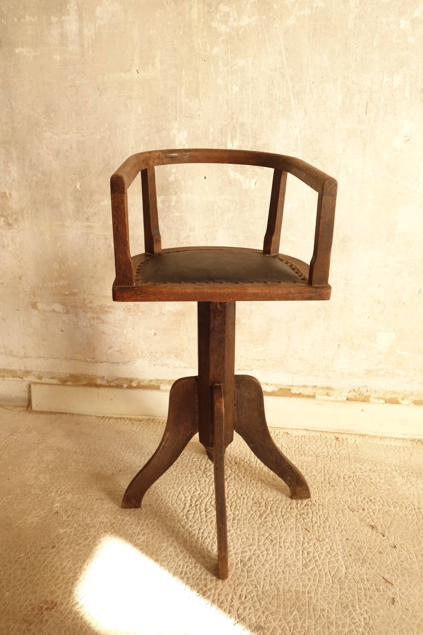 Antique wooden swivel chair