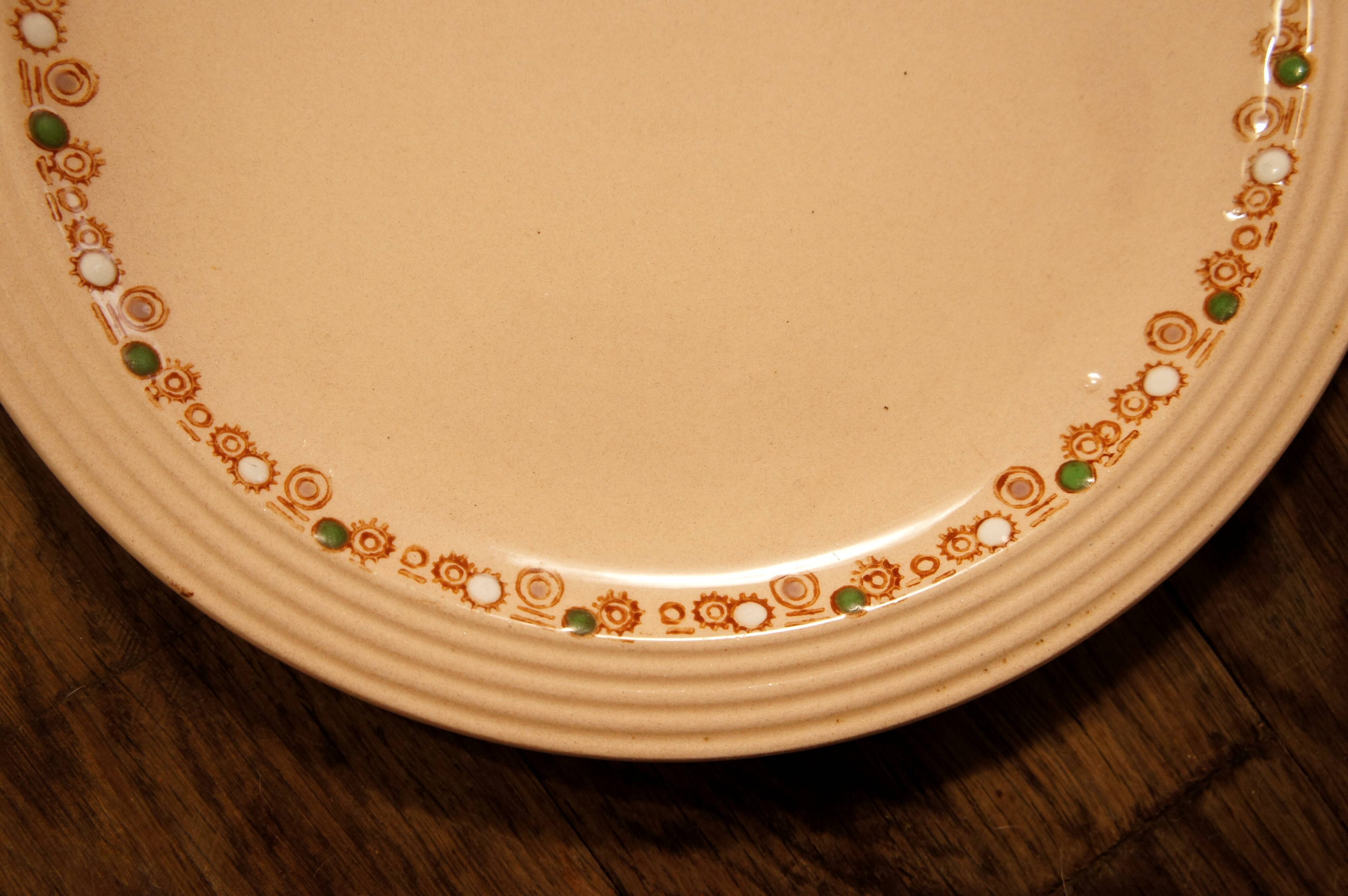 Set of 7 flat plates Longwy "Betty" art deco