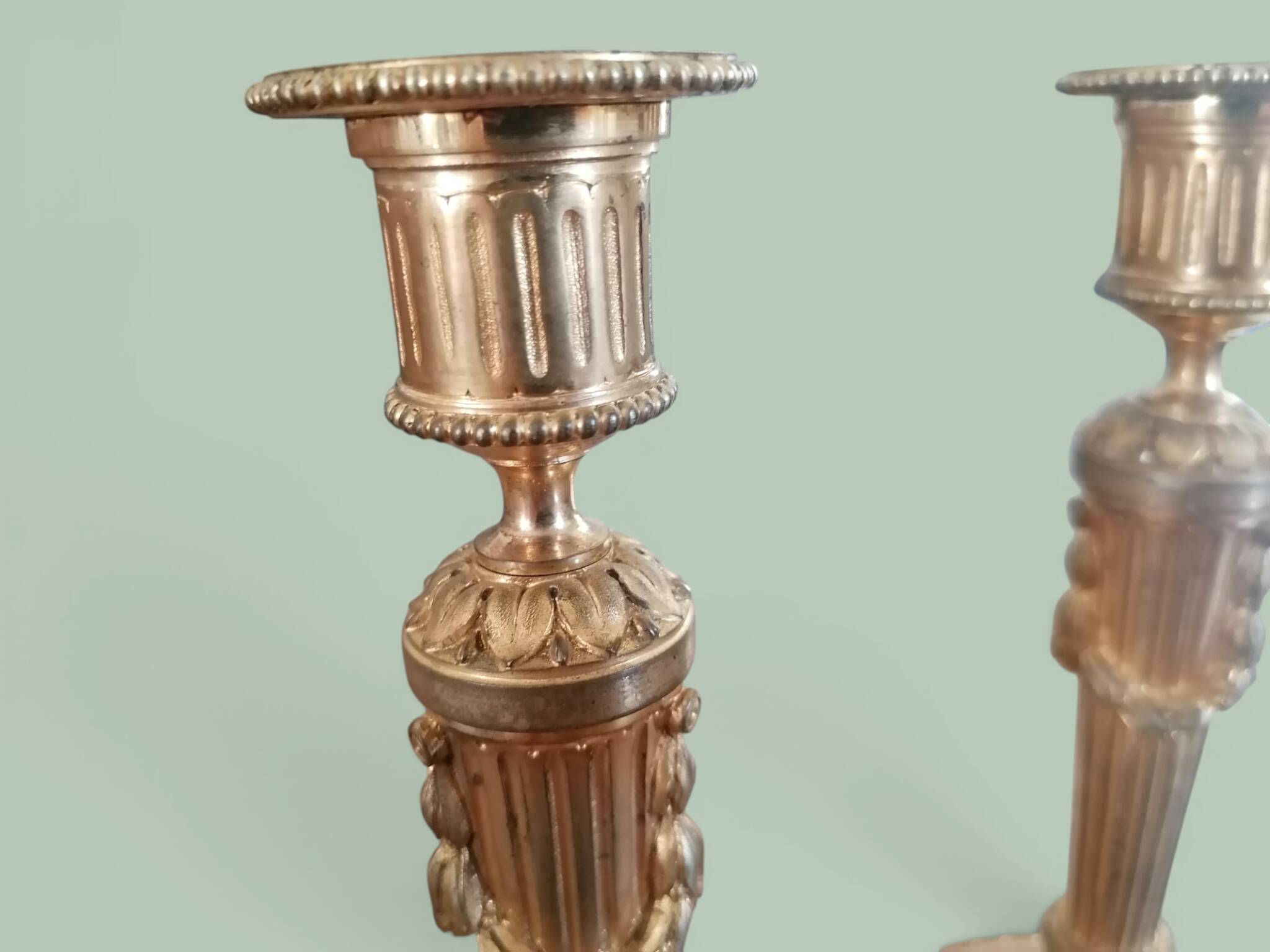 Pair of gilded bronze candlesticks - Louis XVI style.
