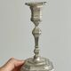 Pair of patinated silver-plated candlesticks