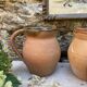 set of terracotta jugs country style