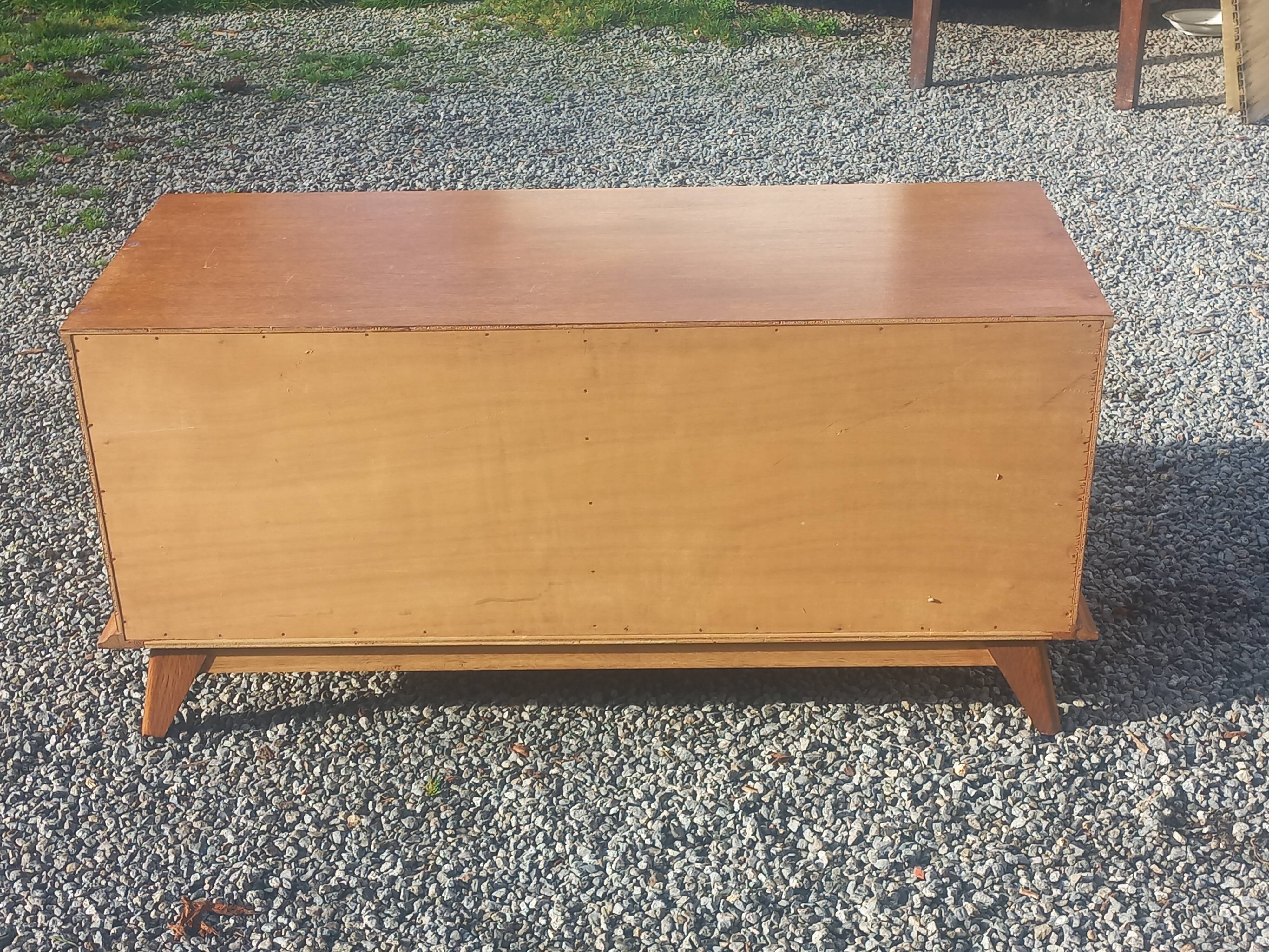 Vintage oak sideboard with splayed legs from the 1950s.