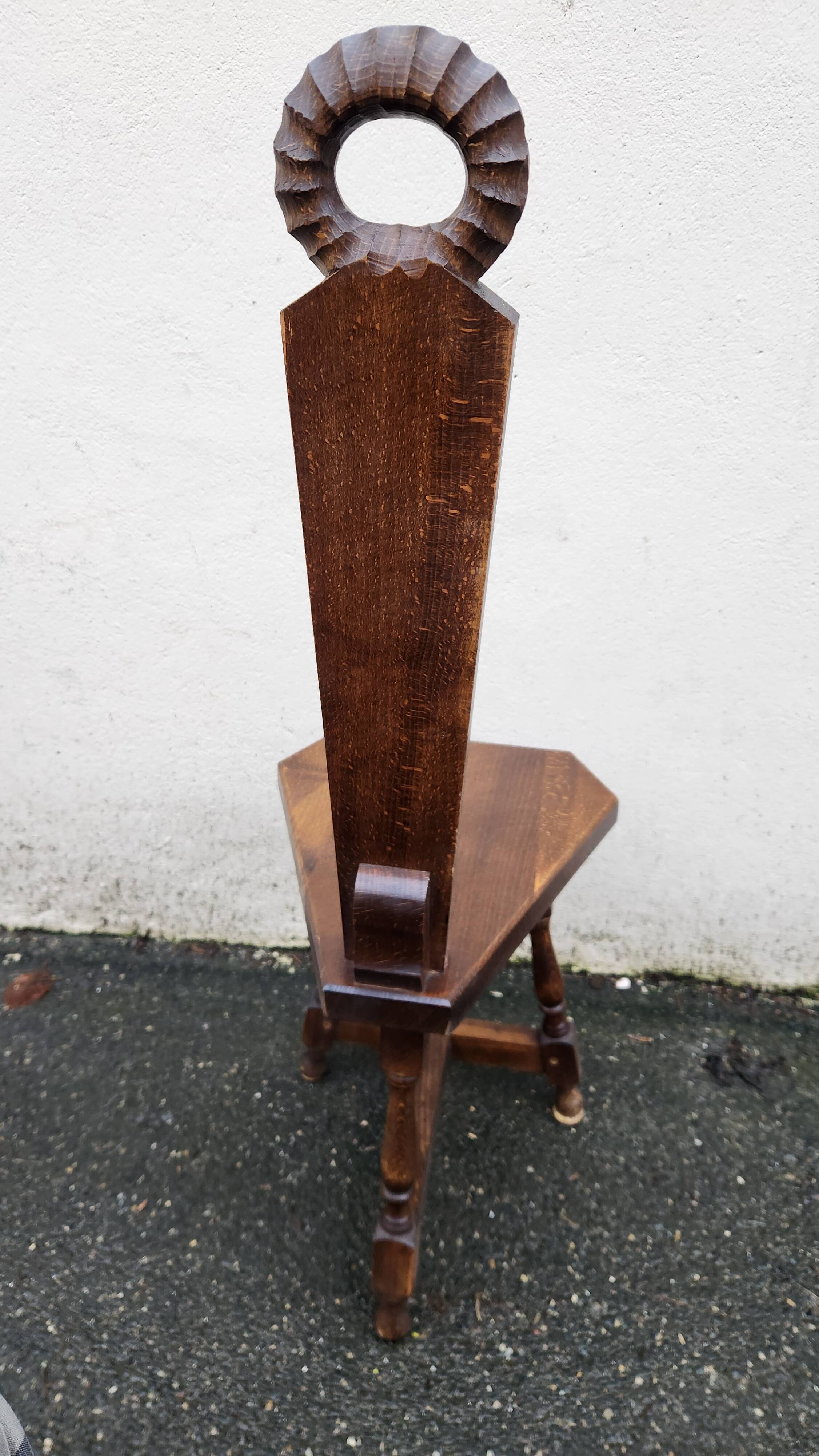 2 three-legged chairs made of solid wood
