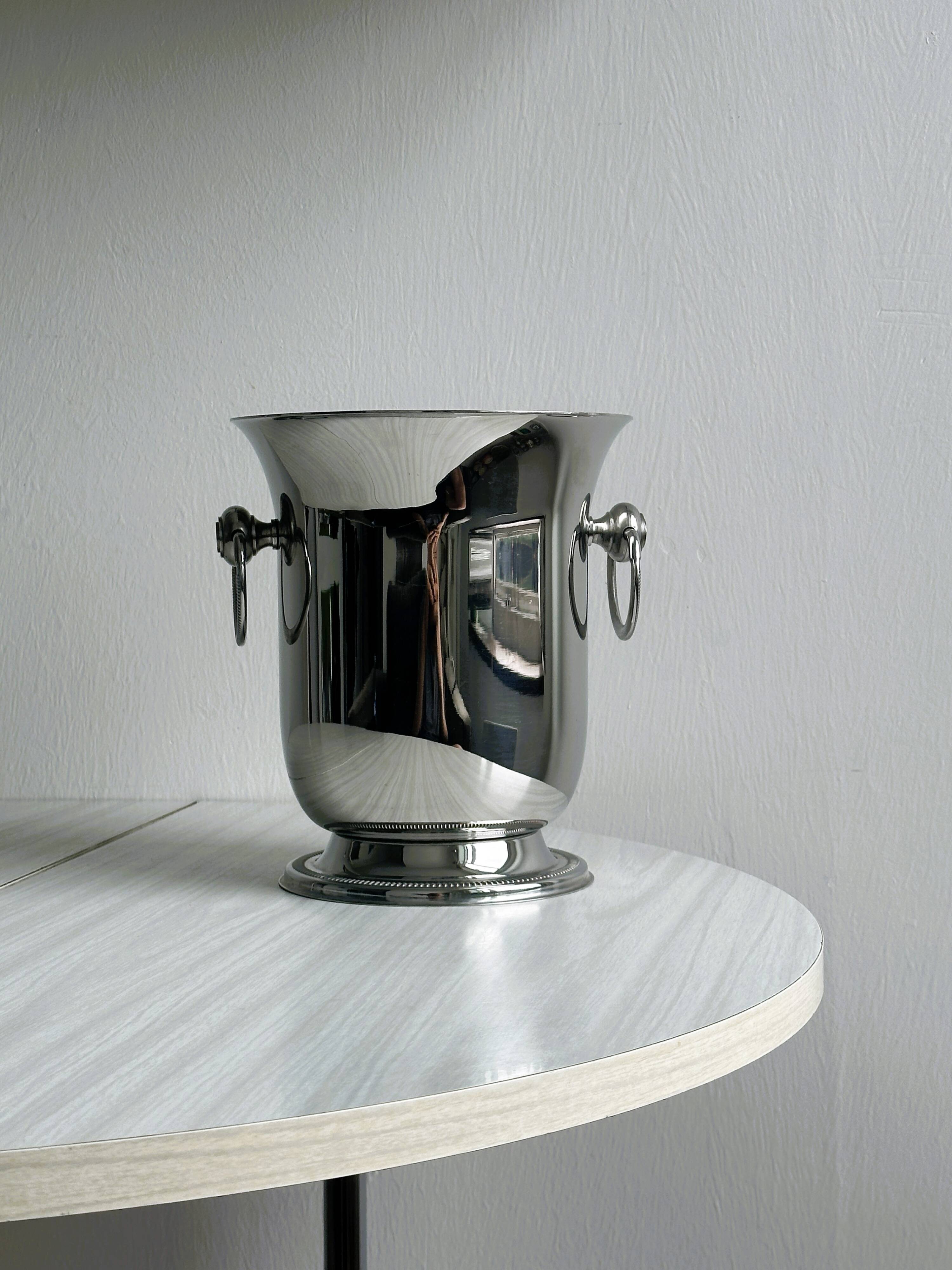 Silver metal champagne bucket