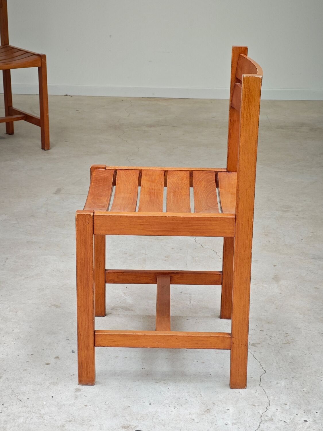 Set of 4 wooden chairs by André Sornay