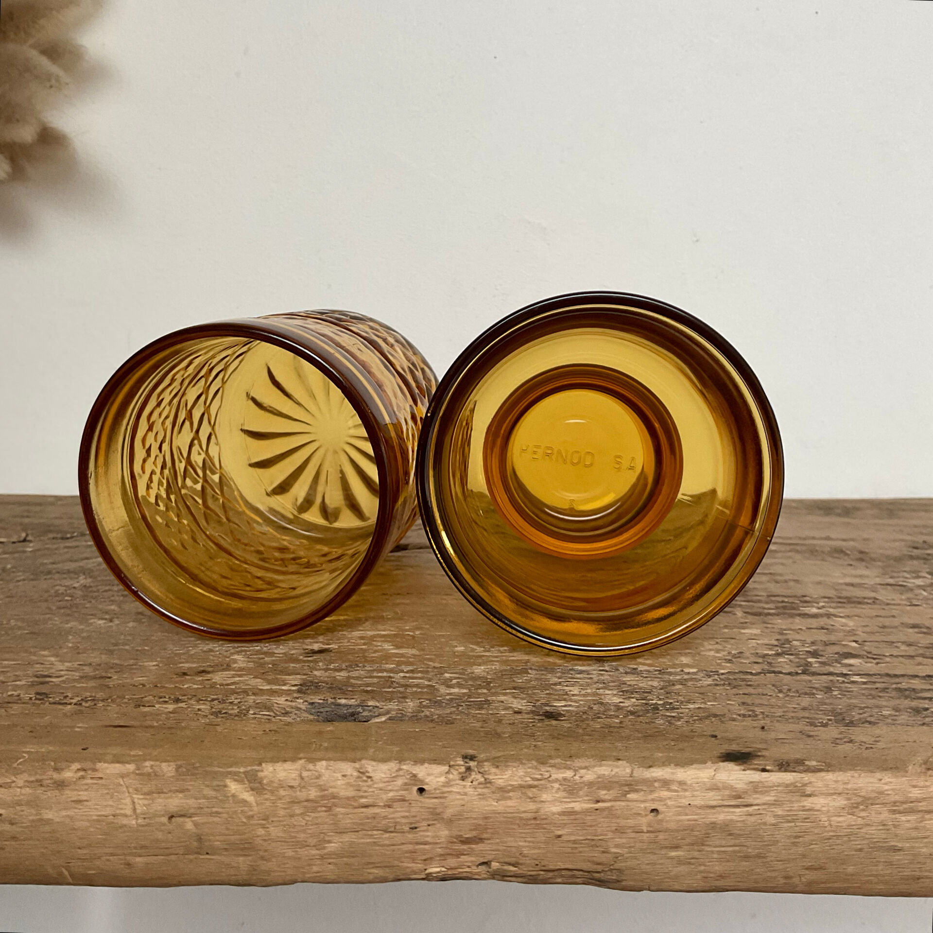 4 mismatched amber glasses