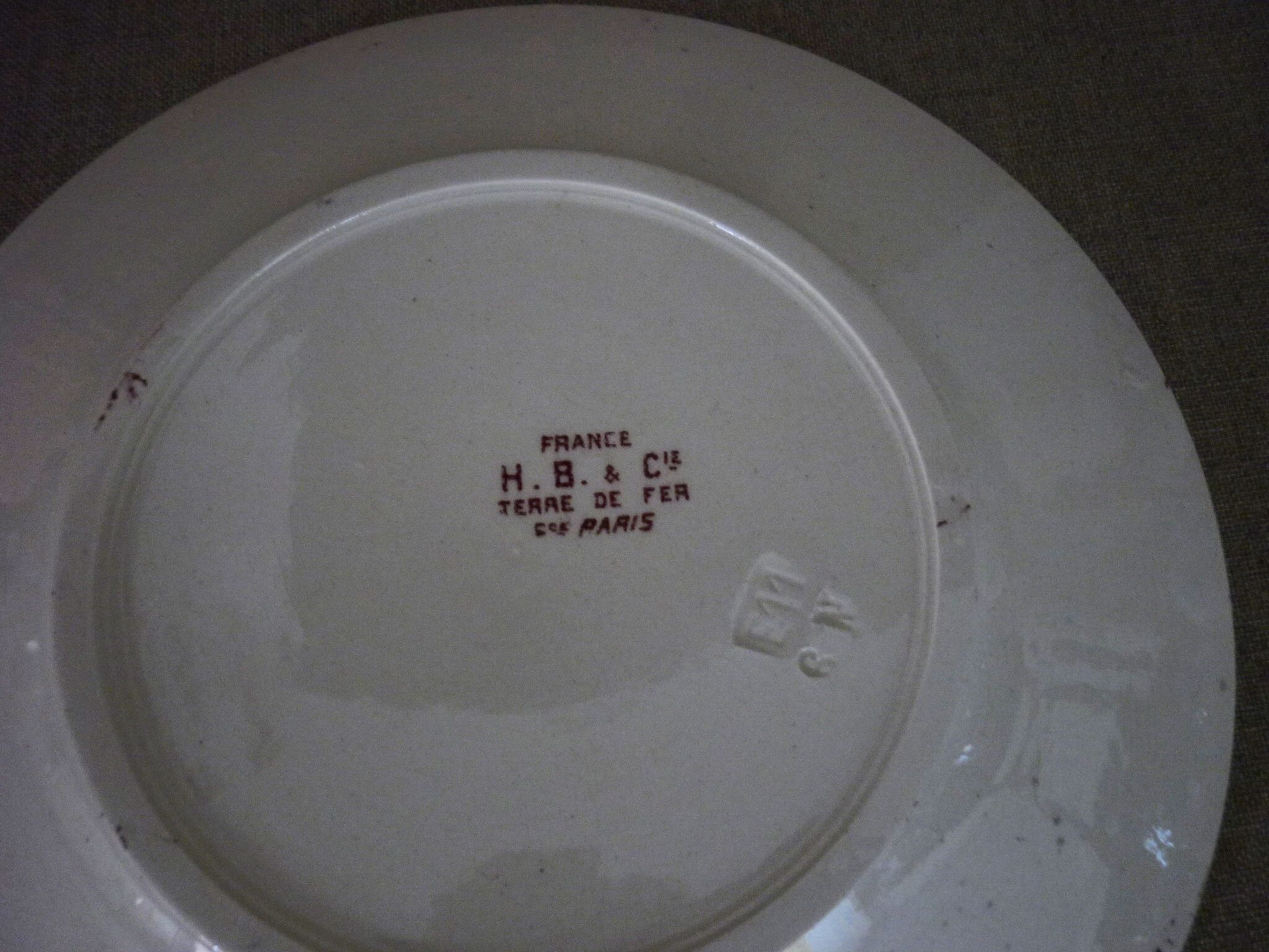 Beige earthenware plate with rose decoration and red garlands