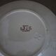 Beige earthenware plate with rose decoration and red garlands
