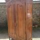 Louis XV Nantaise wardrobe carved with grape clusters, gendarme hat in fine cherry wood, late 19th century.
