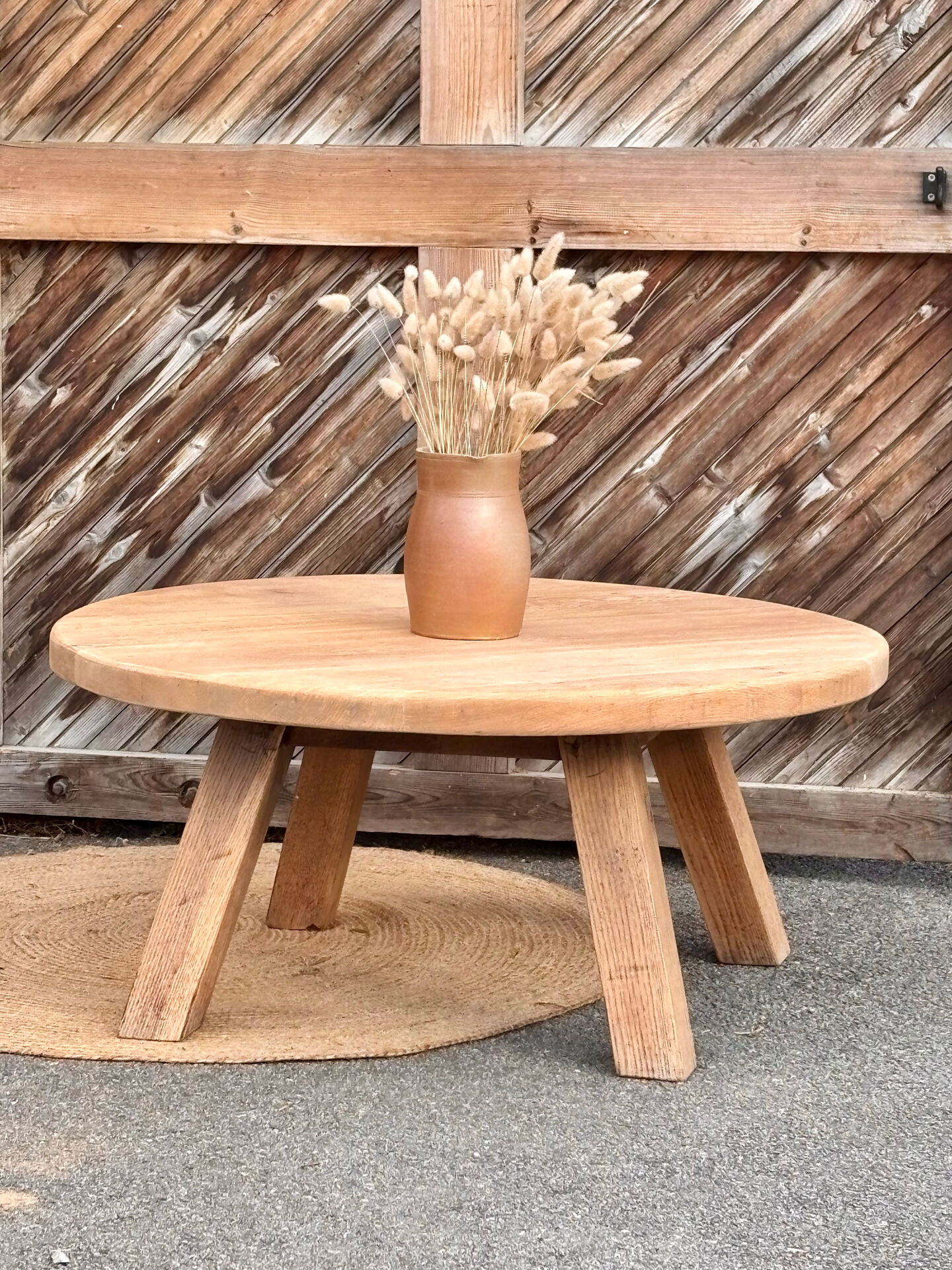 Antique round coffee table in raw solid oak.