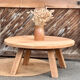 Antique round coffee table in raw solid oak.