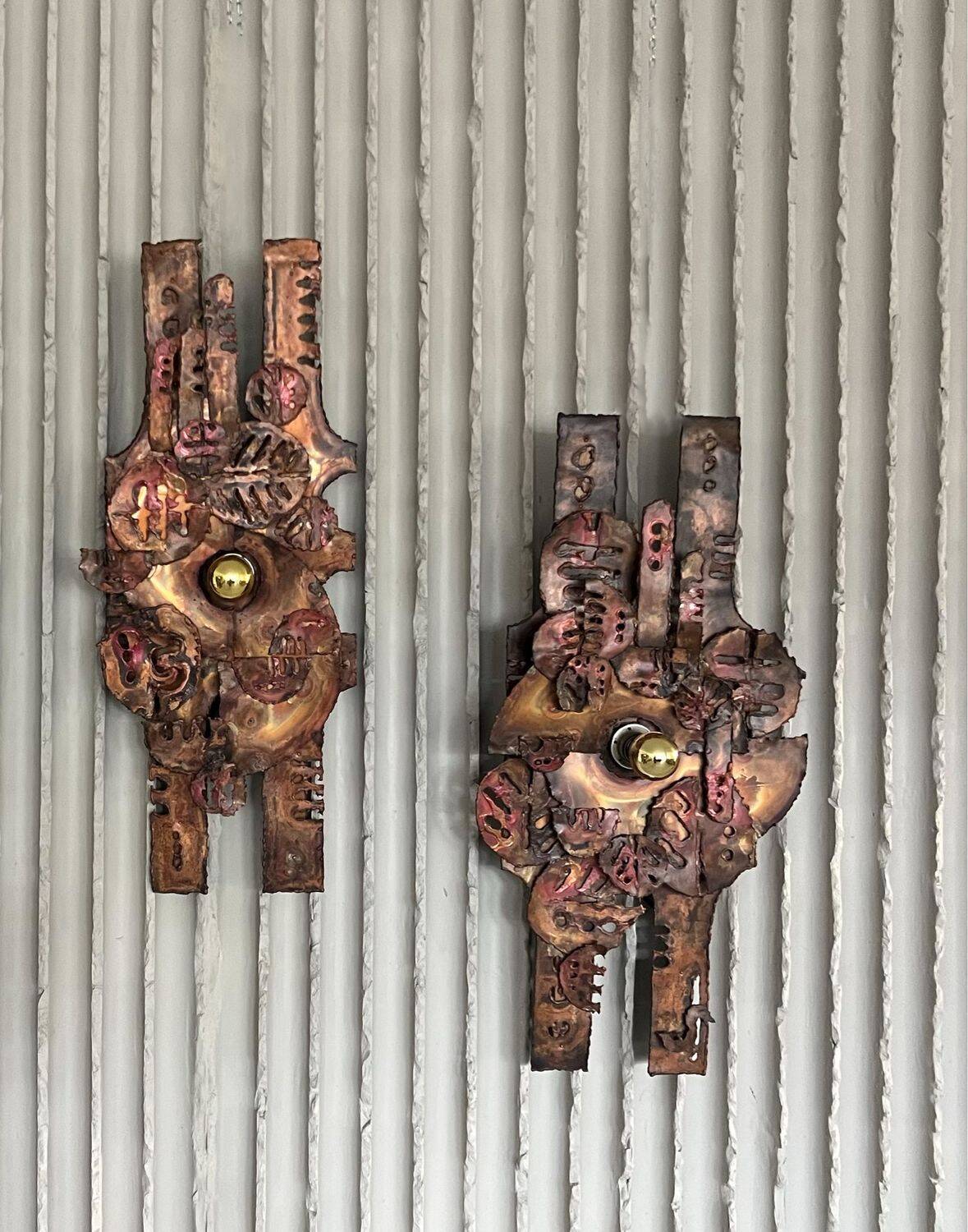 Set of raw expressive wall sconces by Francesco Pasinato