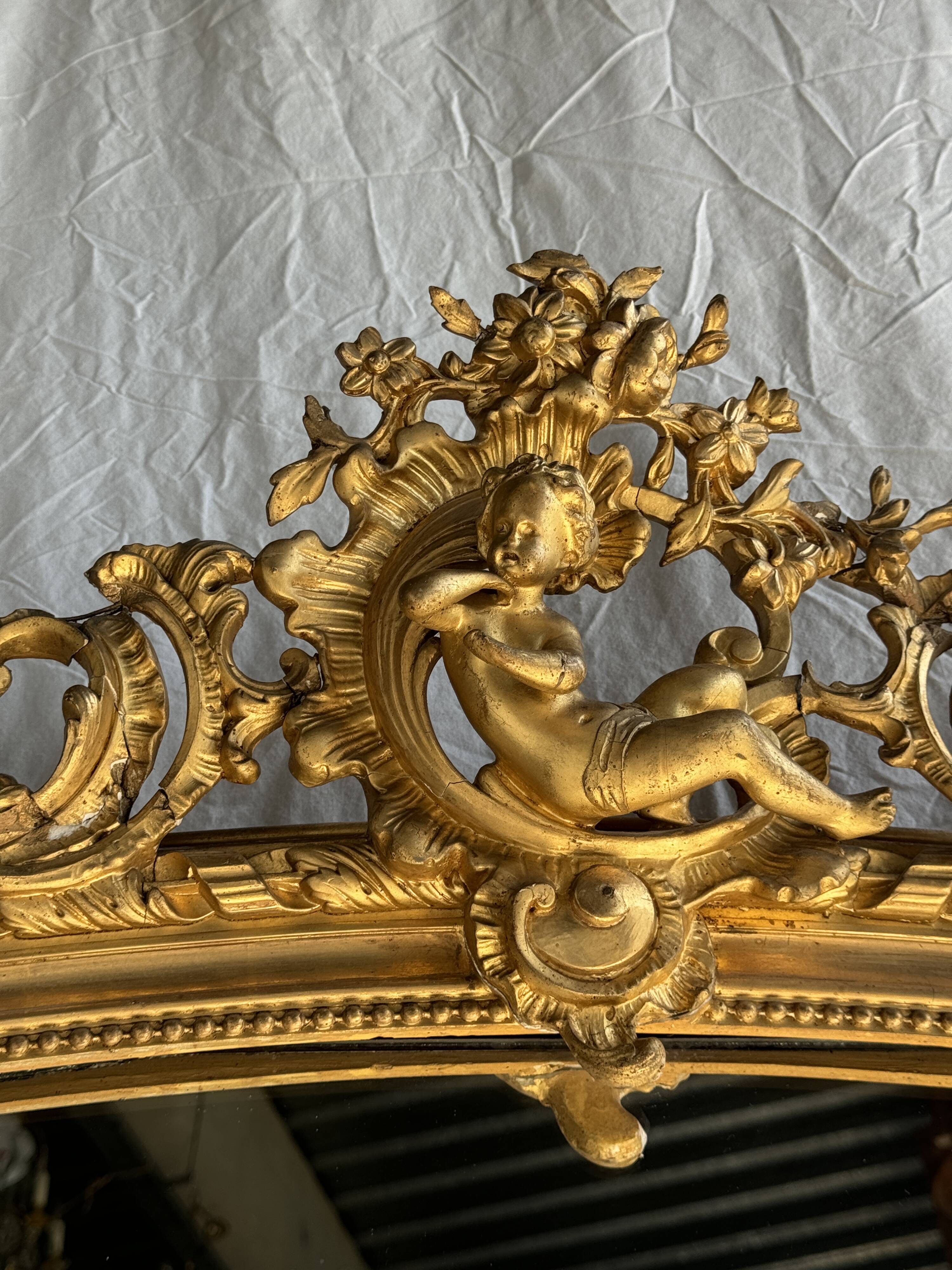 Large gilded mirror with acanthus leaf pediment H150 L98